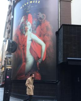 Didi Derrière photographed for billboard poster on the side of the iconic Windmill Theatre 